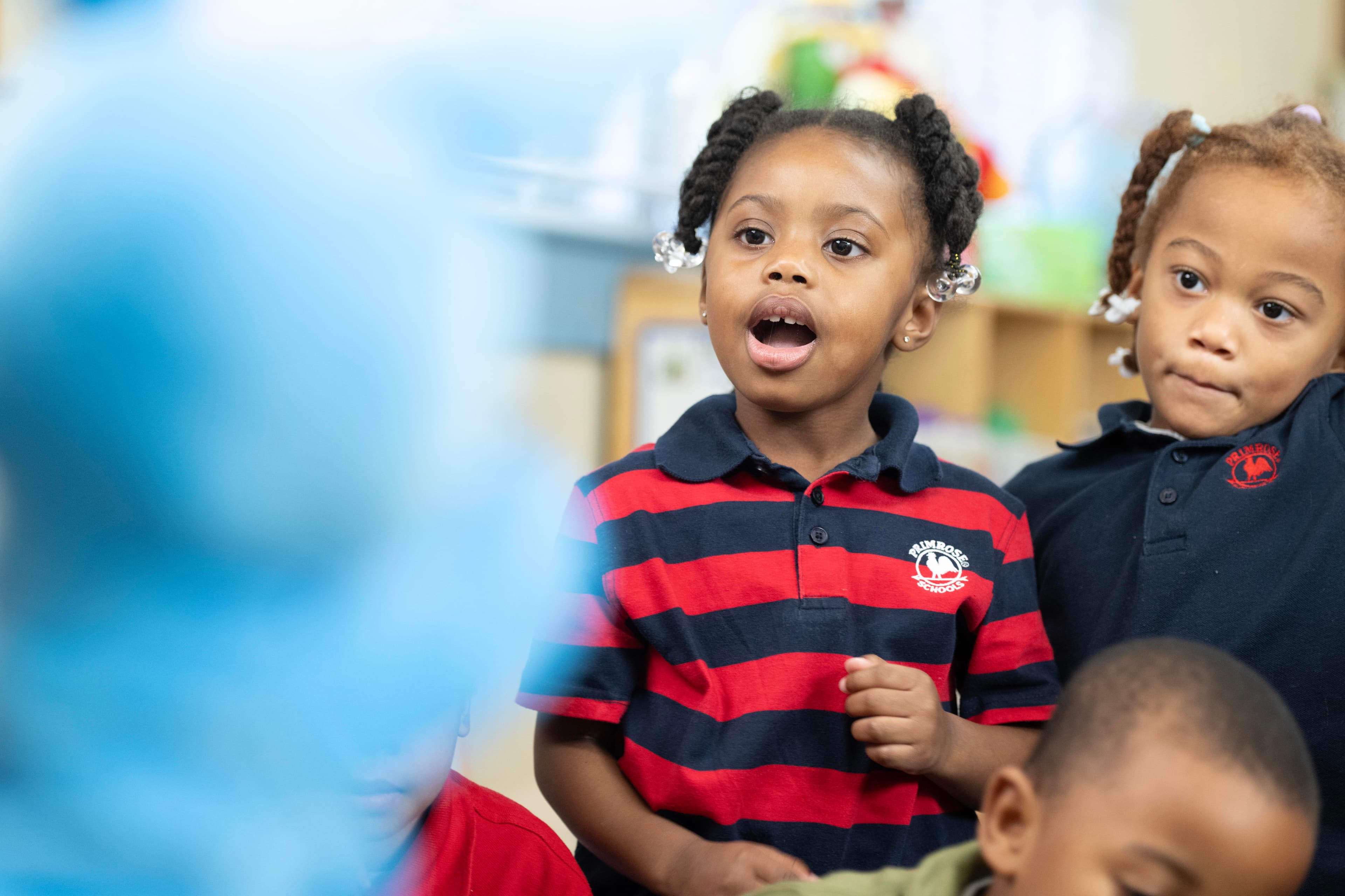 child engaging in classroom activity