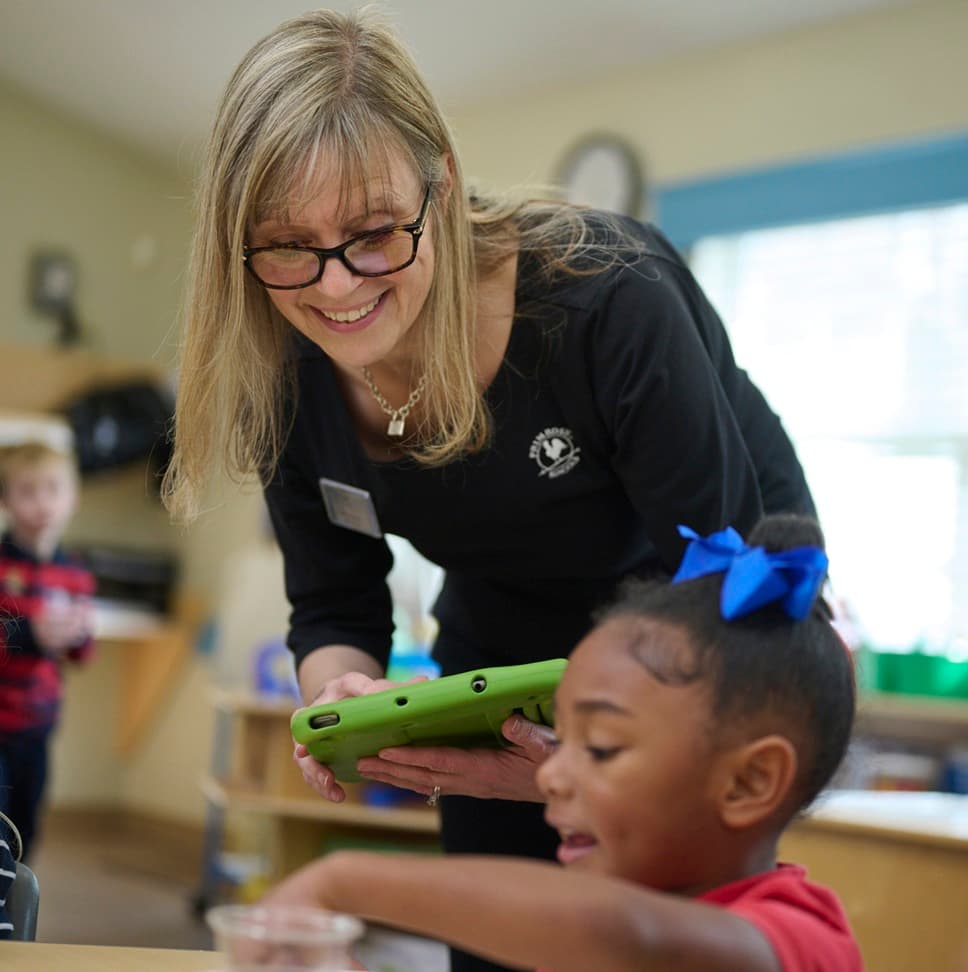 teacher speaking with child
